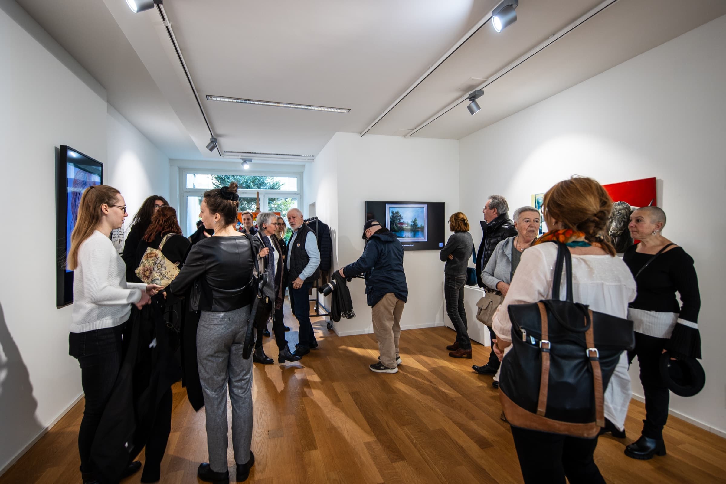 Guests at an opening at Thomson Gallery